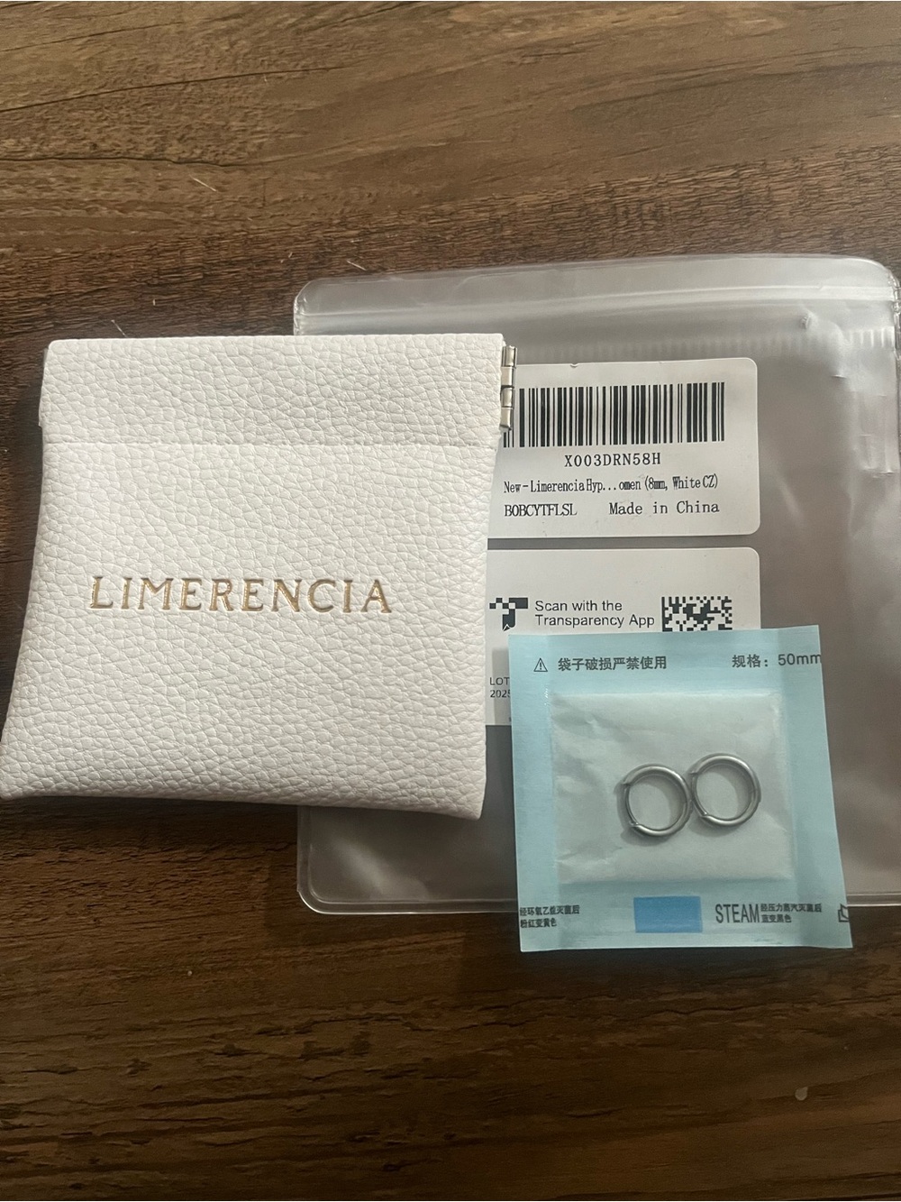 Amazon Limerencia Silver Hoop Earrings with White Pouch